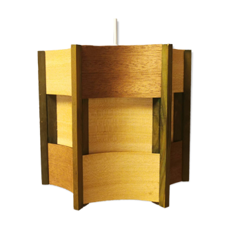 Older lamp in wood veneer, partially painted in green colour.