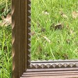 Rustic mirror called brutalist, molded carved natural wood