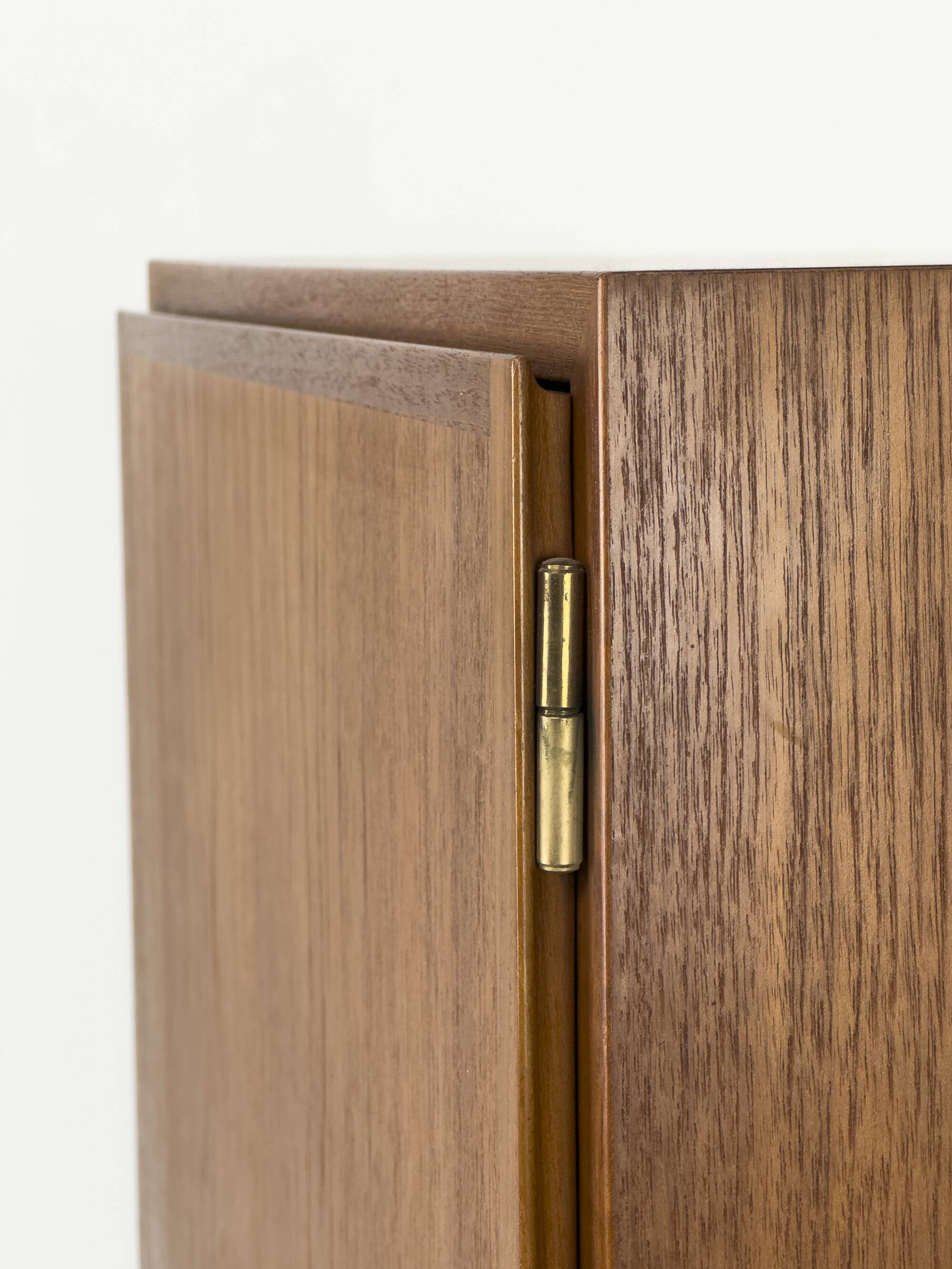 Narrow teak bookcase with two doors by Omann Jun, 1970s