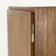 Narrow teak bookcase with two doors by Omann Jun, 1970s