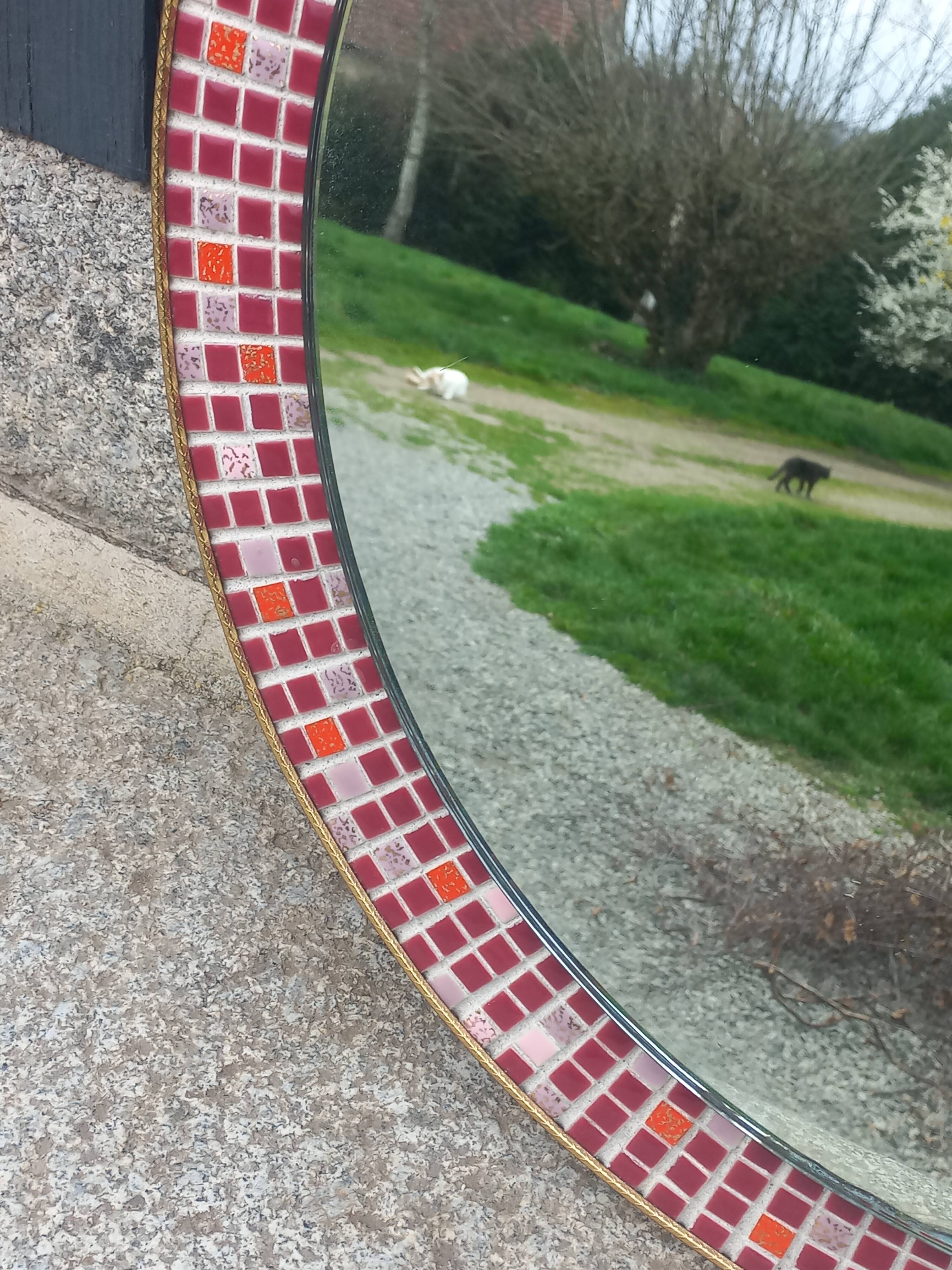 Vintage ceramic mirror from the 1960s.