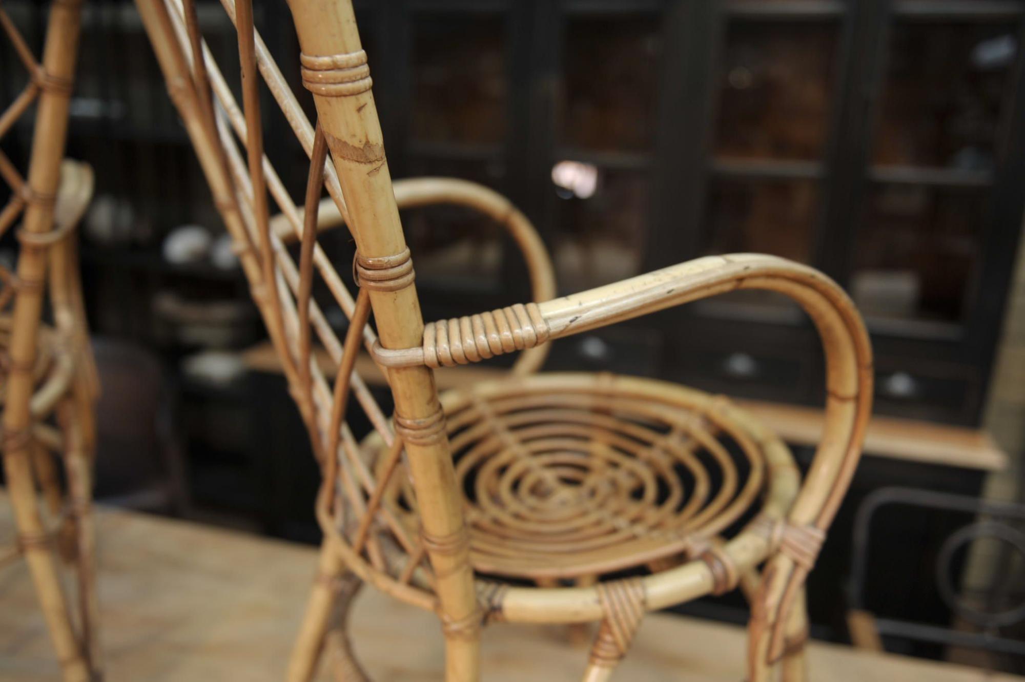 Pair of chairs in rattan 1960 by Louis Sognot