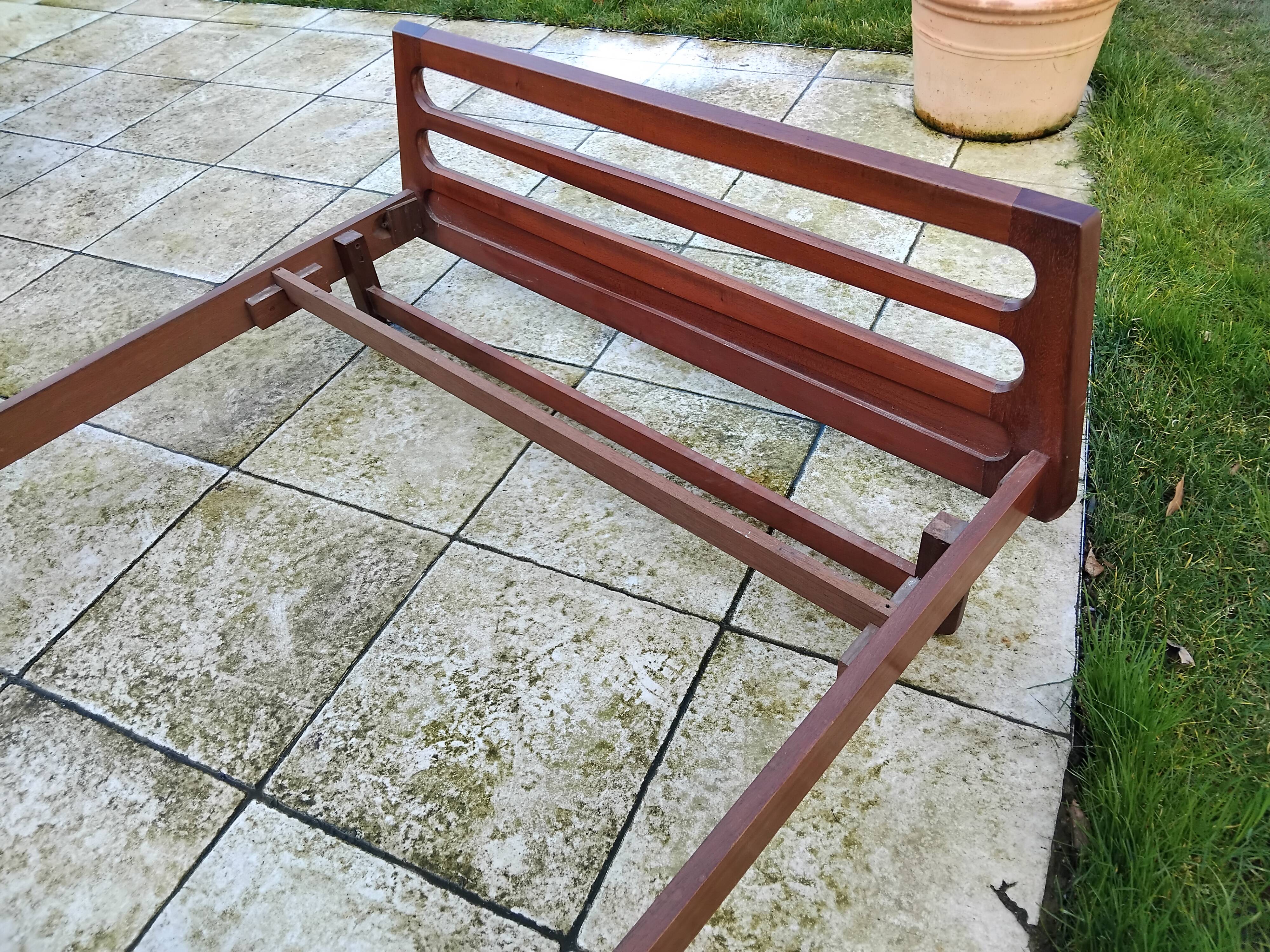 Vintage Scandinavian teak adult bed from the 60s and 70s bedside table.