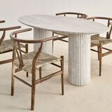 Natural travertine oval dining table - striated foot