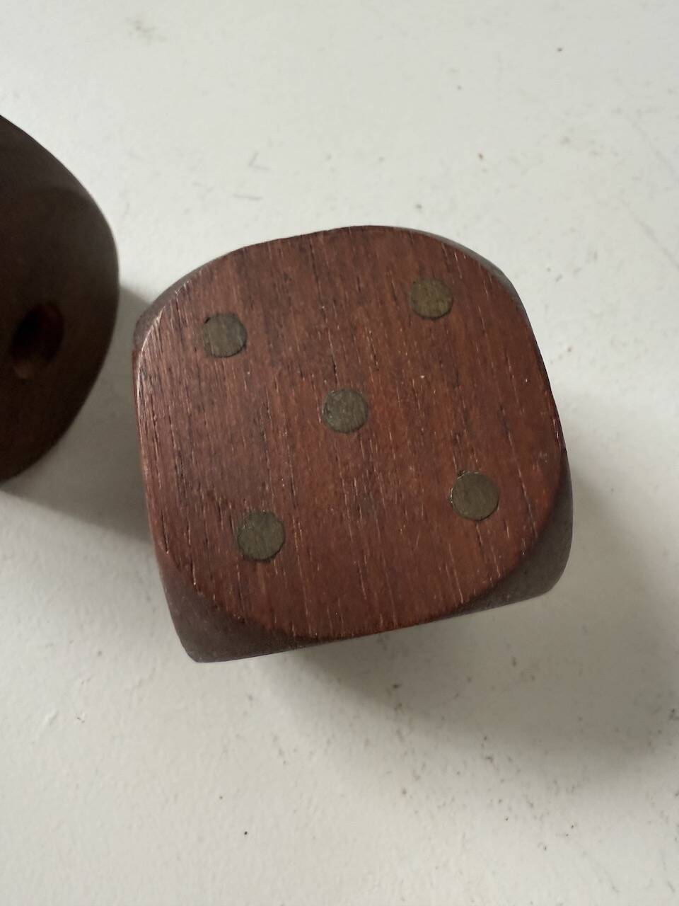 Pair of 1960s teak and brass "dice" candlesticks