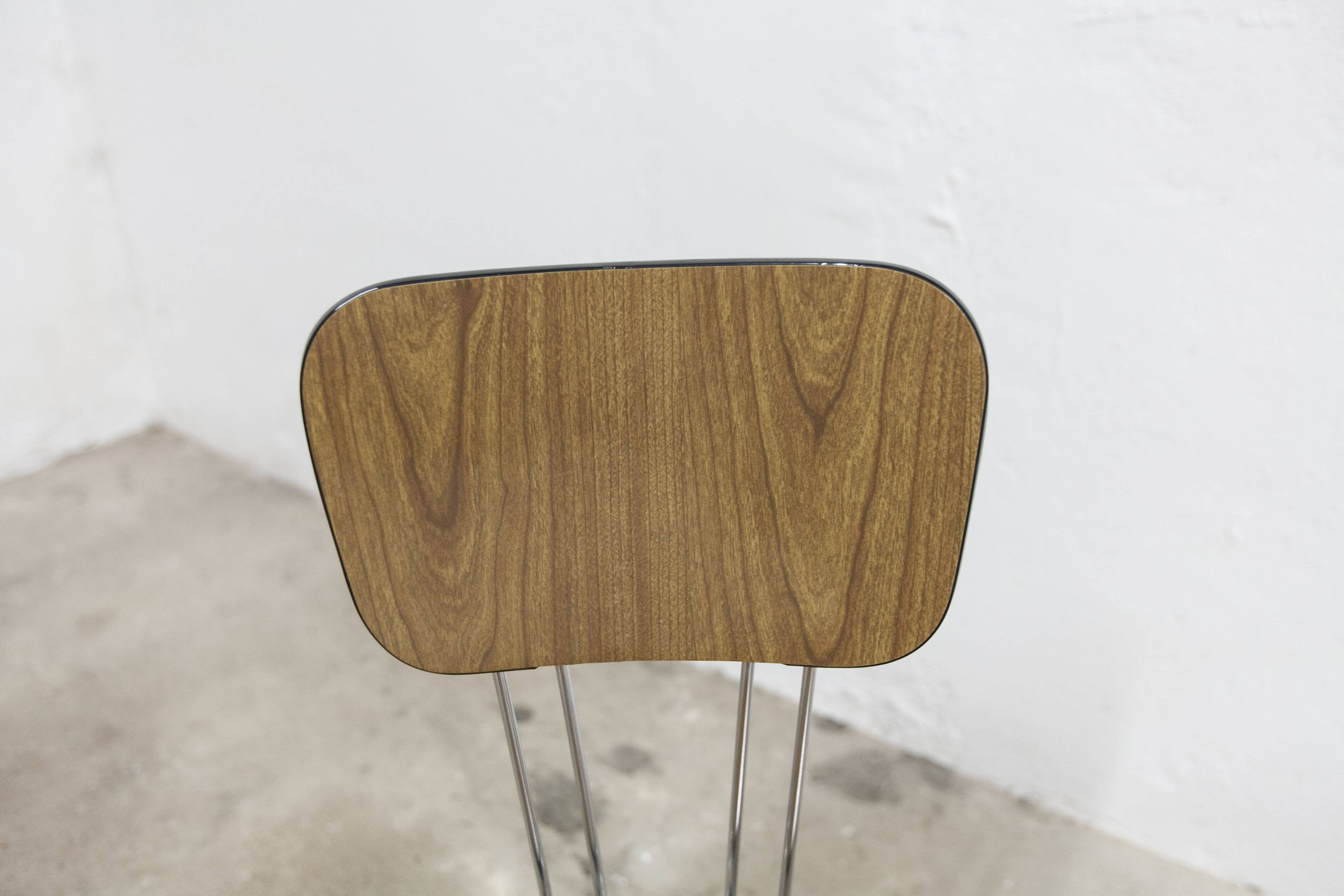 Pair of Formica 1970 brown Eiffel feet chairs