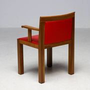 A masterpiece of Italian modernism: eleven Aldo Rossi red Teatro arm chairs