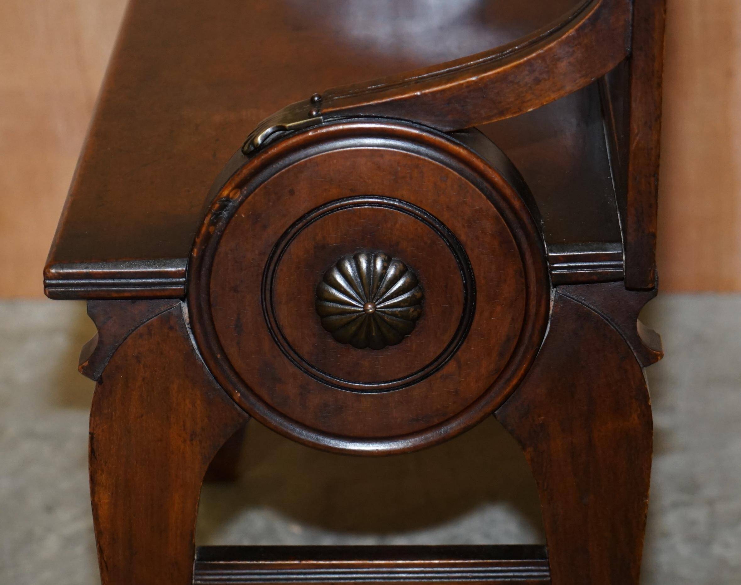 Antique entrance bench by Jas Shoolbred with brass fittings and walnut frame circa 1890.