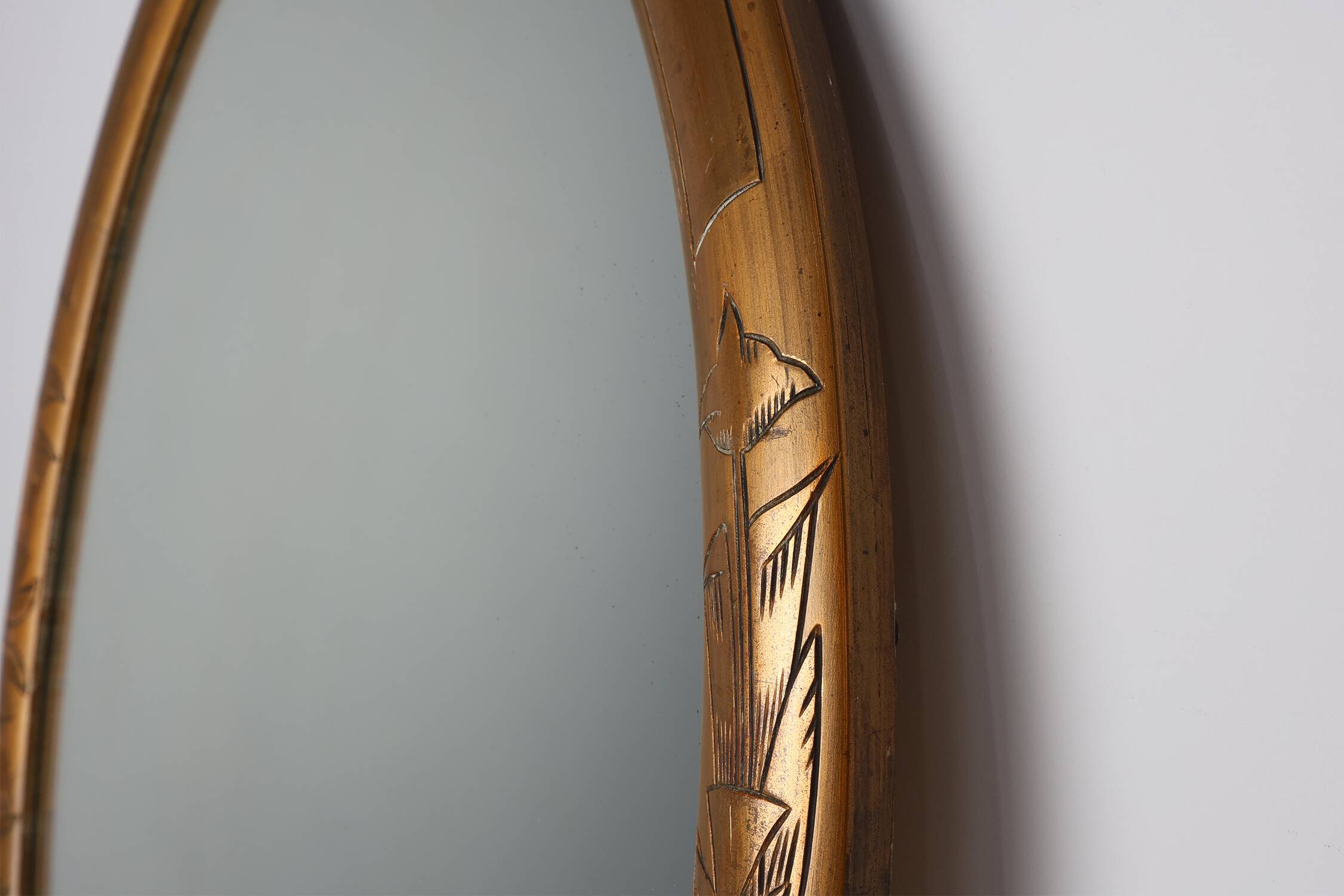 French Art Deco Oval gilded Mirror in Carved Wood, ca. 1920