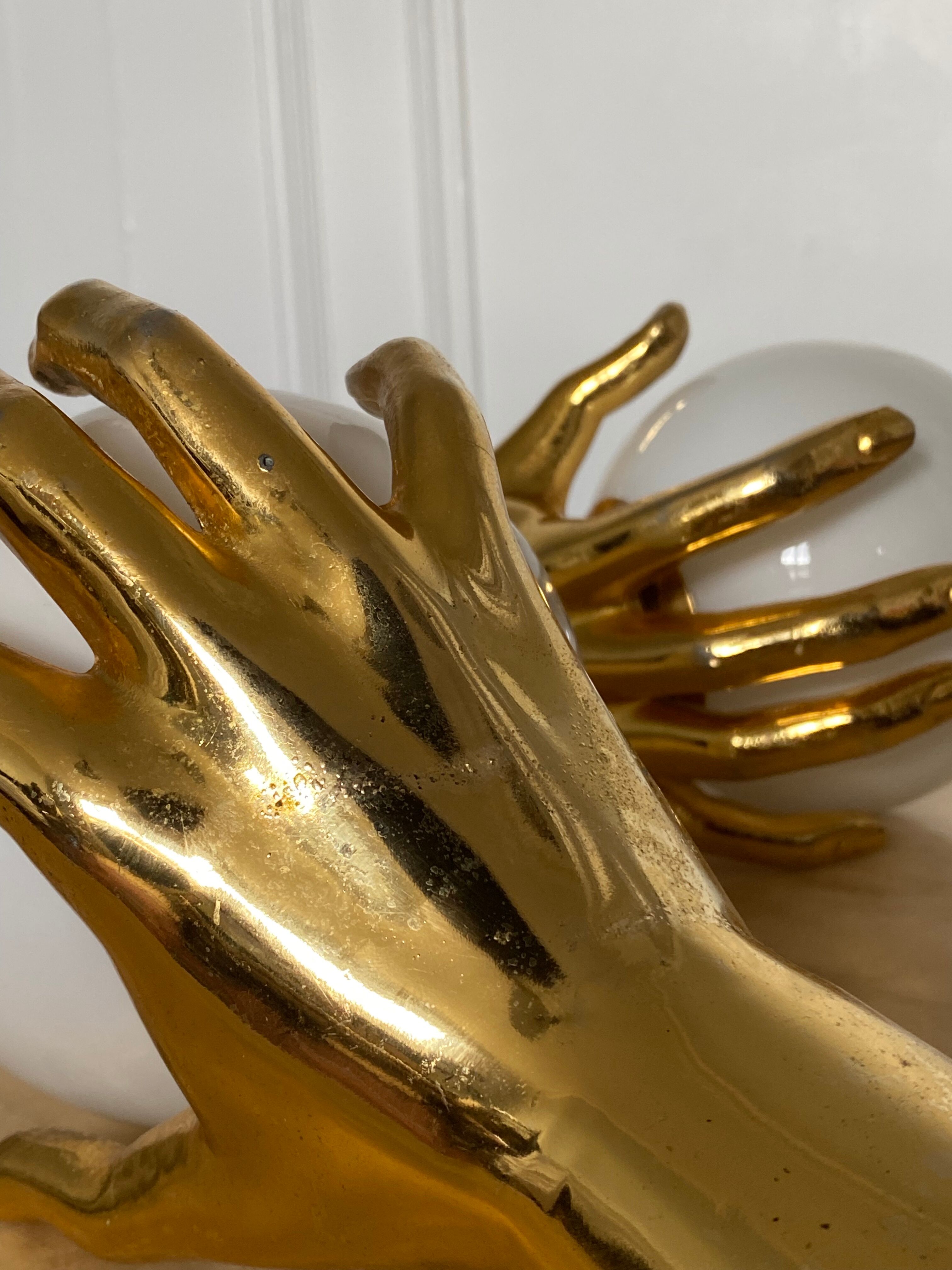 Pair of Arlus hand sconces