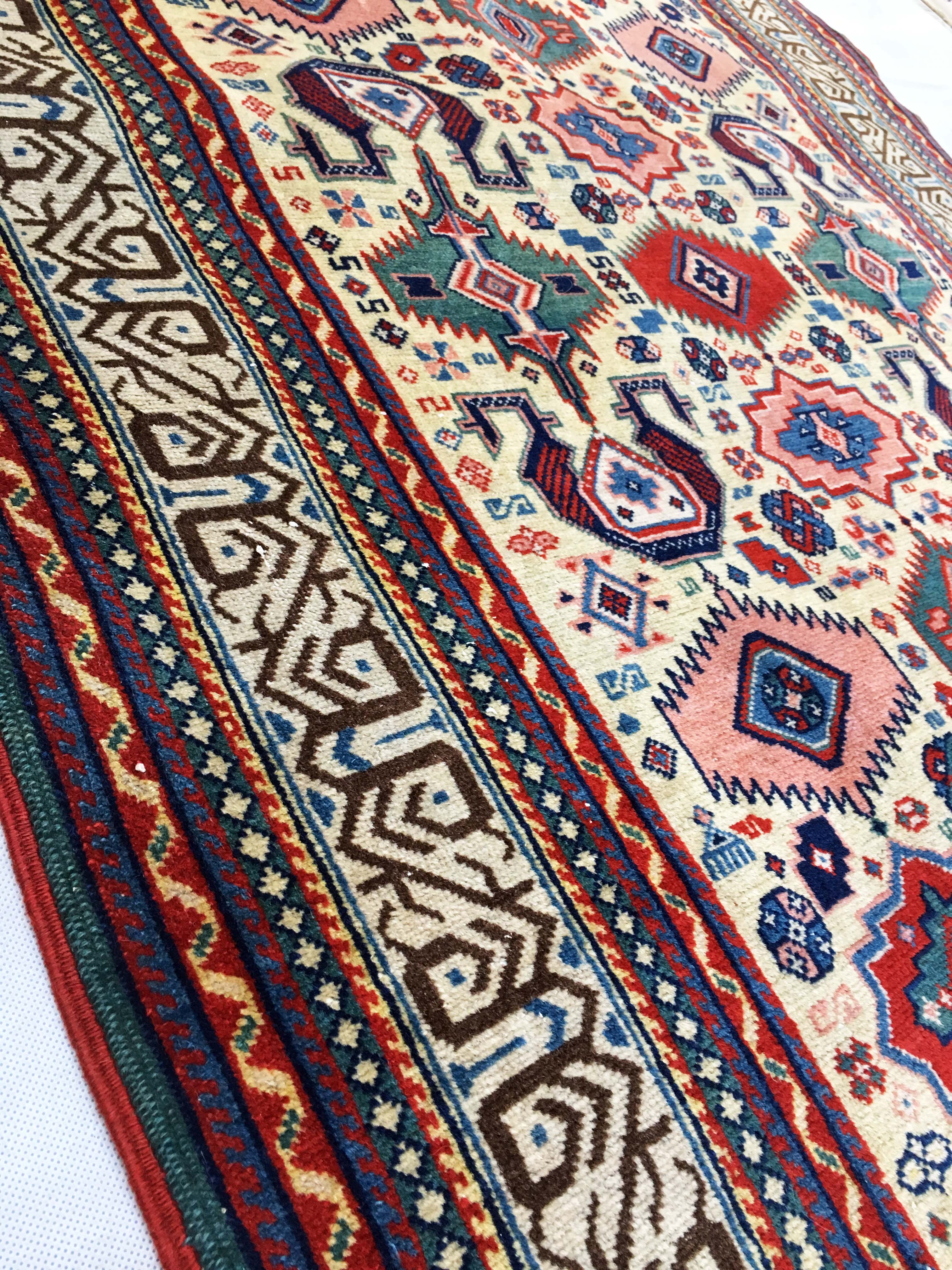 Hand made oriental rug: former Shirvan Perepedil 180 x 110 cm around 1930.