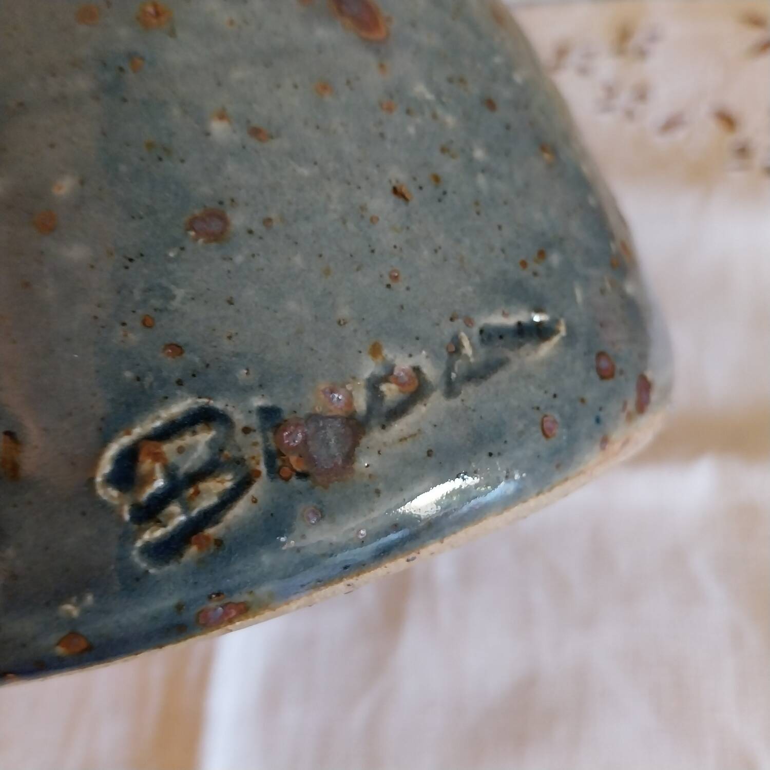 Glazed stoneware jug signed Baudat