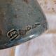 Glazed stoneware jug signed Baudat