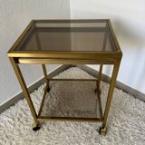 Brass rolling trolley with smoked glass from the 70s