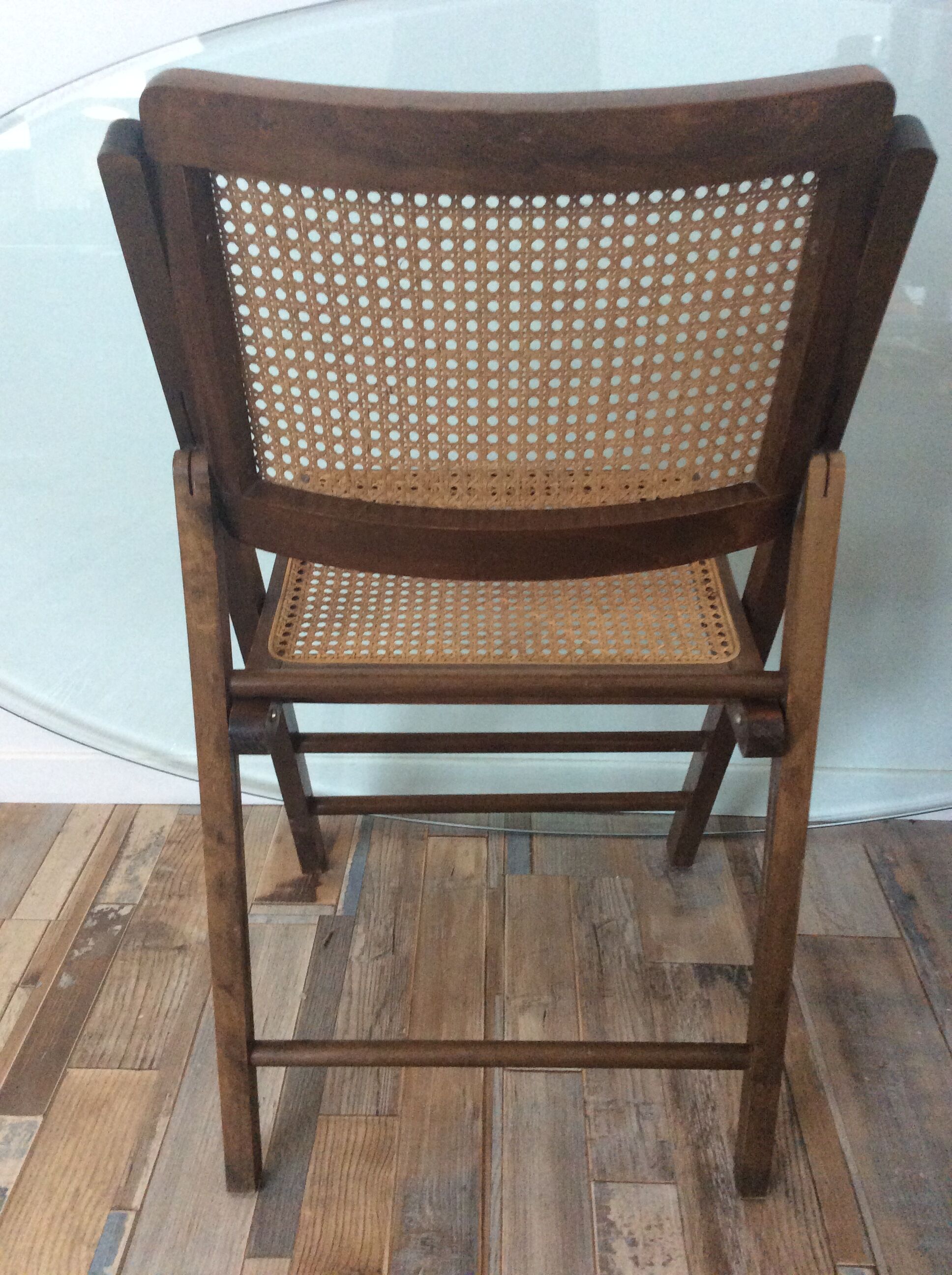 Folding chair caned from the 70s