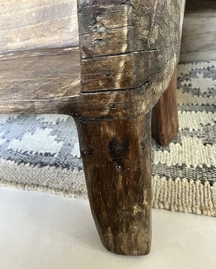 Traditional monoxyle bench in solid Indian wood.