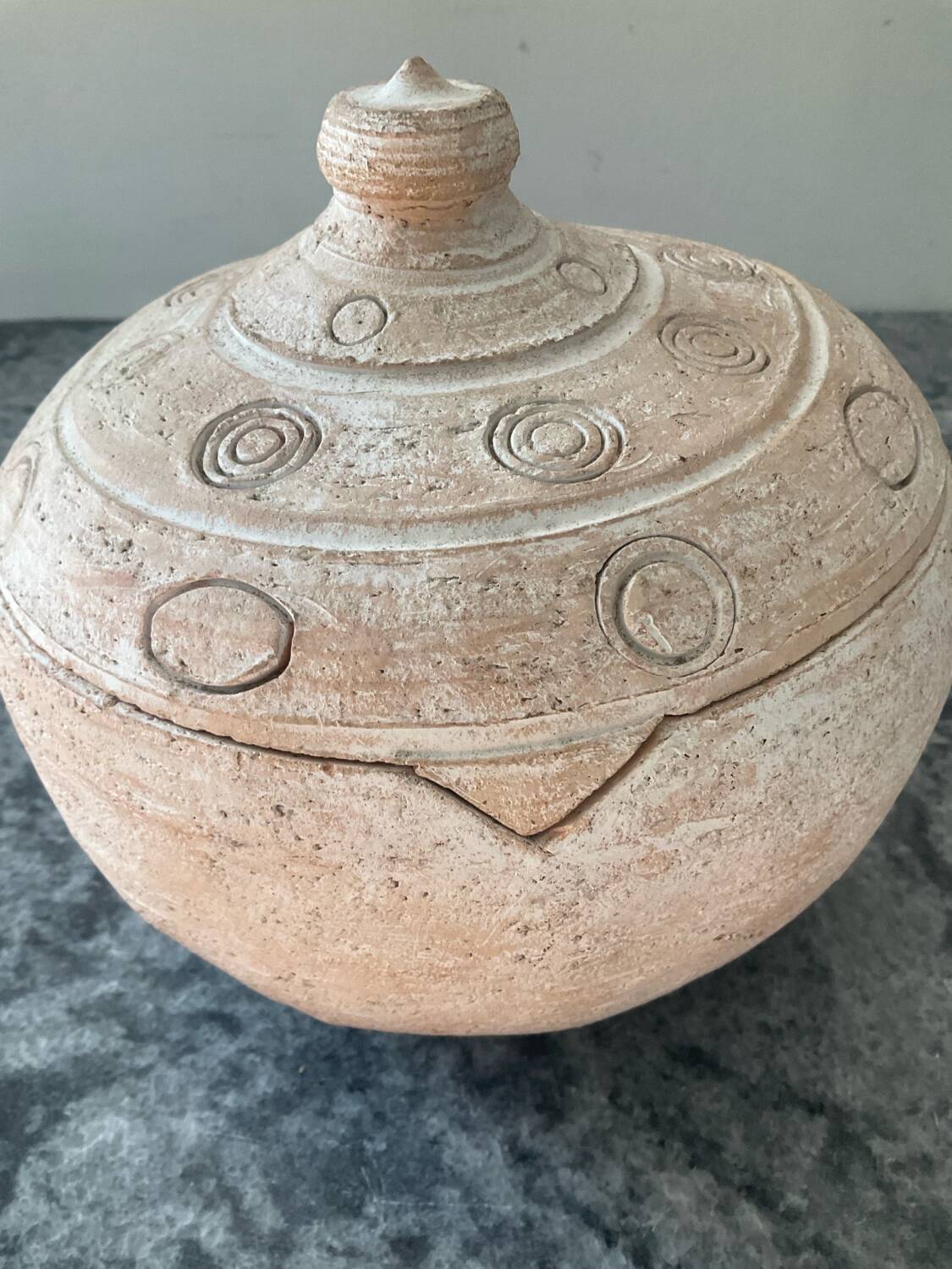 Vintage terracotta pot with lid.