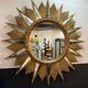 Golden sunburst mirror with wooden rays - 1950s