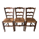 Wooden and straw chairs