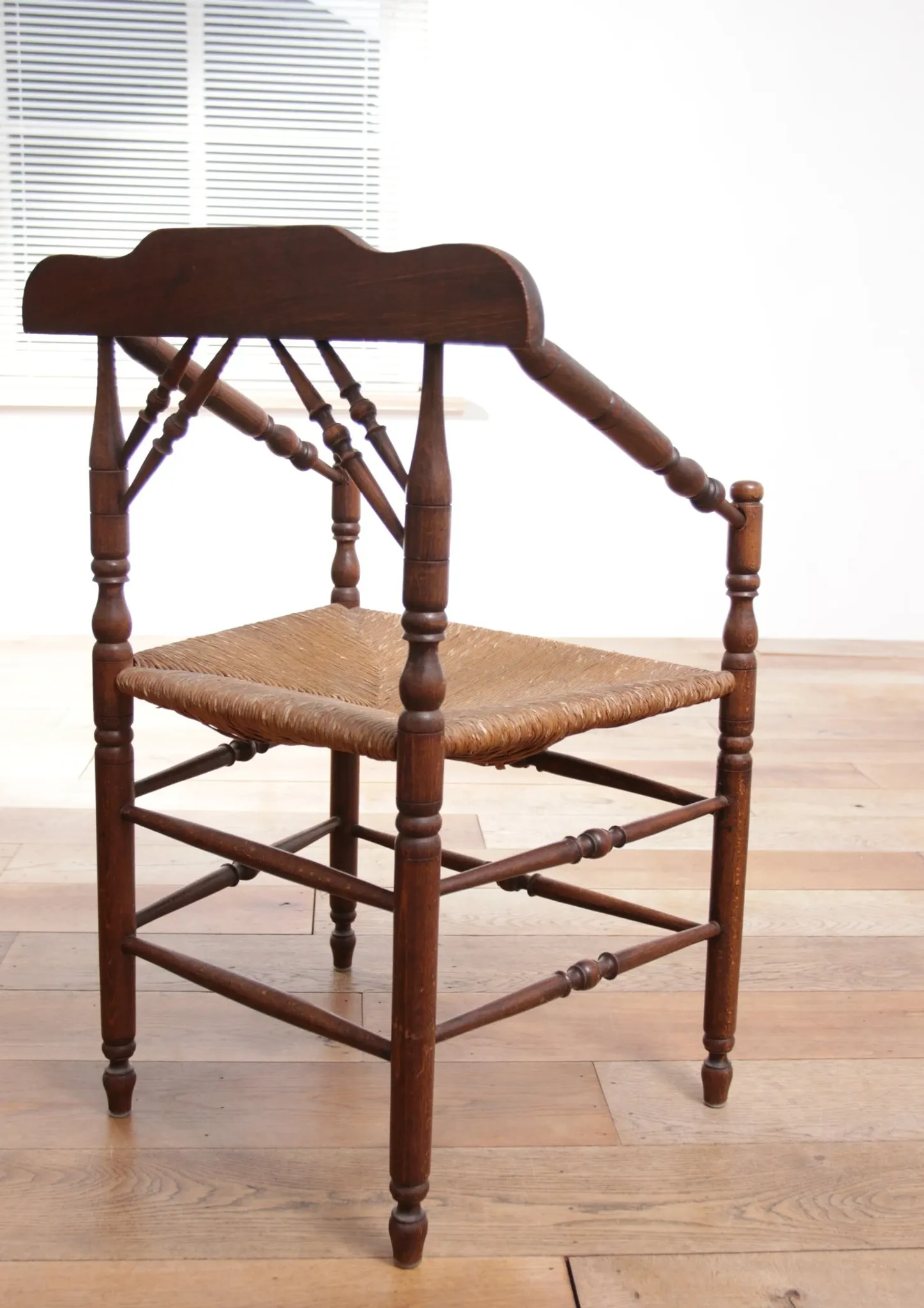 Rare antique Dutch oak armchair with rush seat
