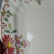 2 antique Longchamp dishes with daisies in polychrome ironstone.