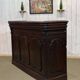 Early 20th-century oak bar counter with period zinc and tin cladding.