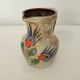 Ceramic pitcher with floral motif signed Saint Clément
