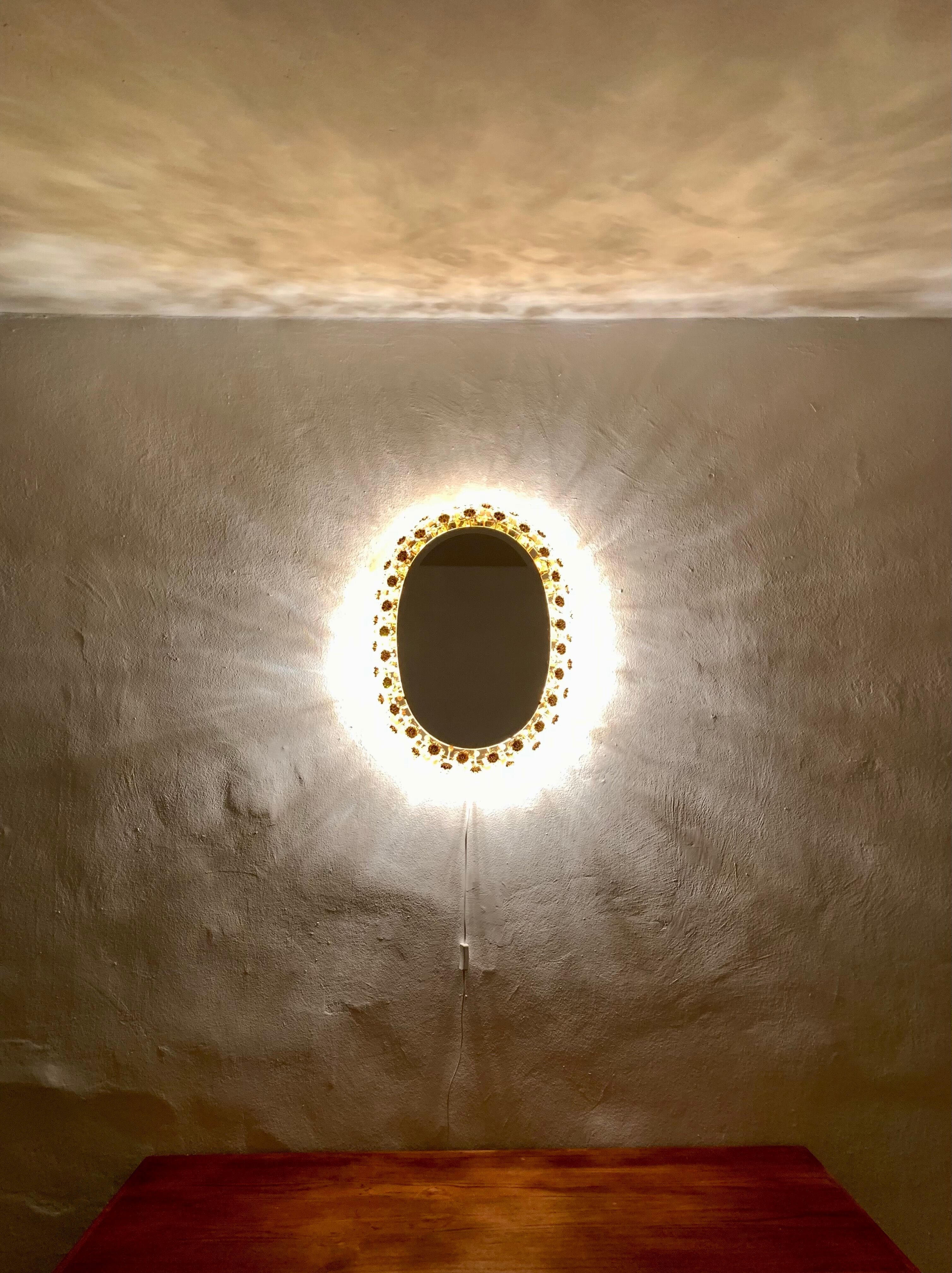 Illuminated floral mirror by Palwa