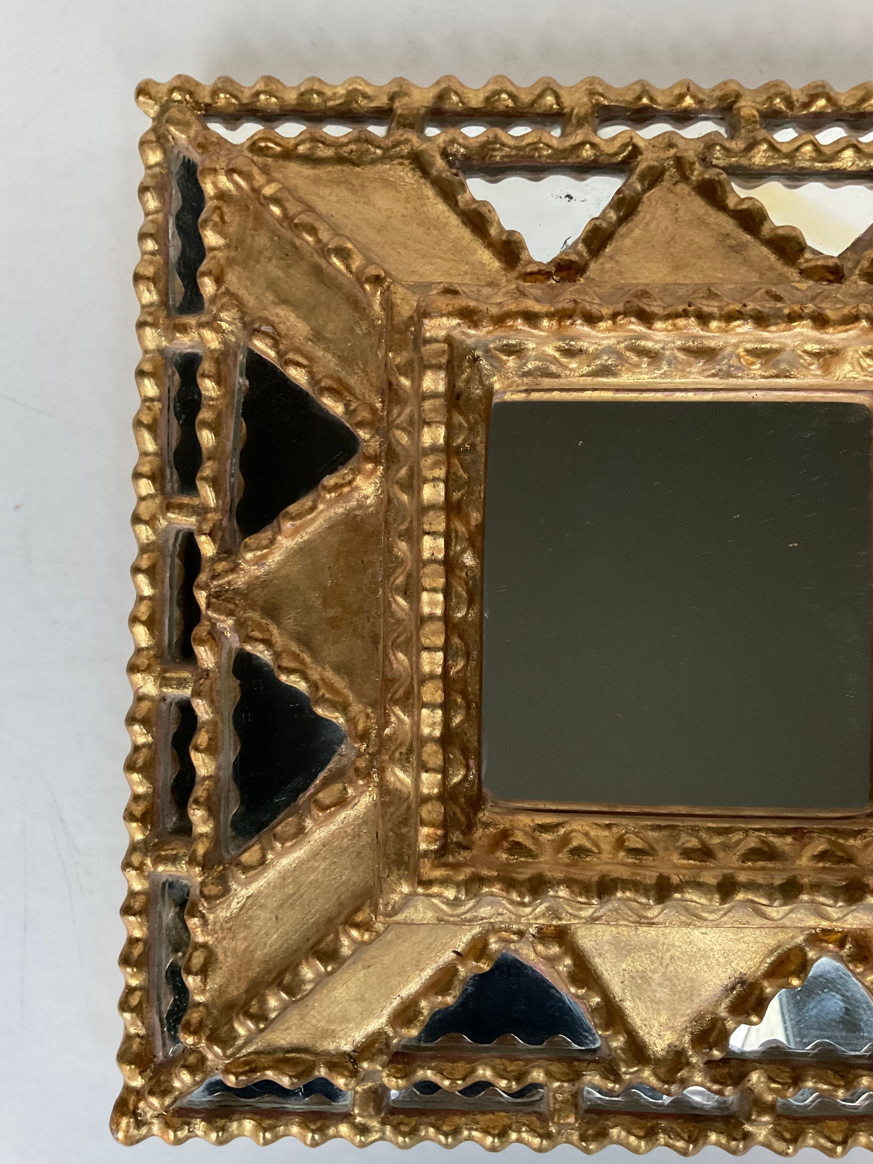 Mirror with parclose ien gilded wood