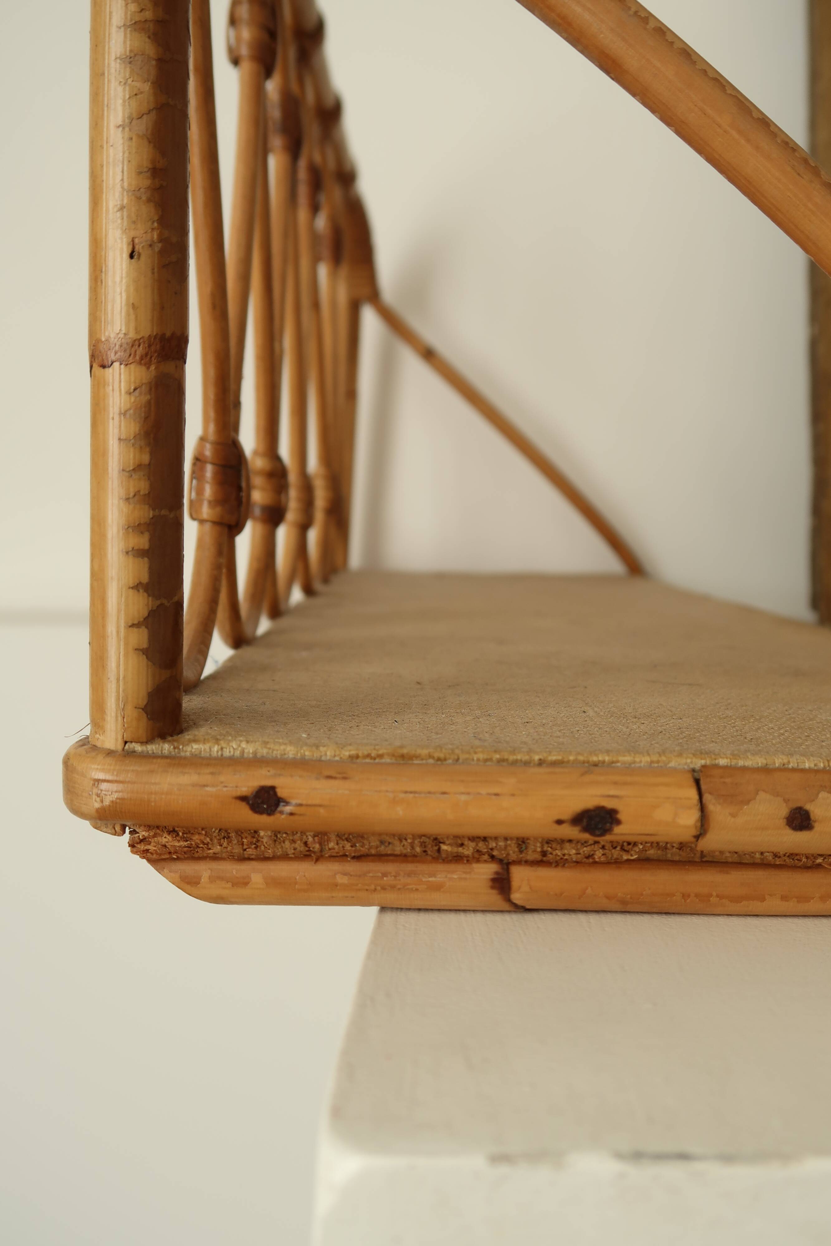 Pair of rattan wall shelves