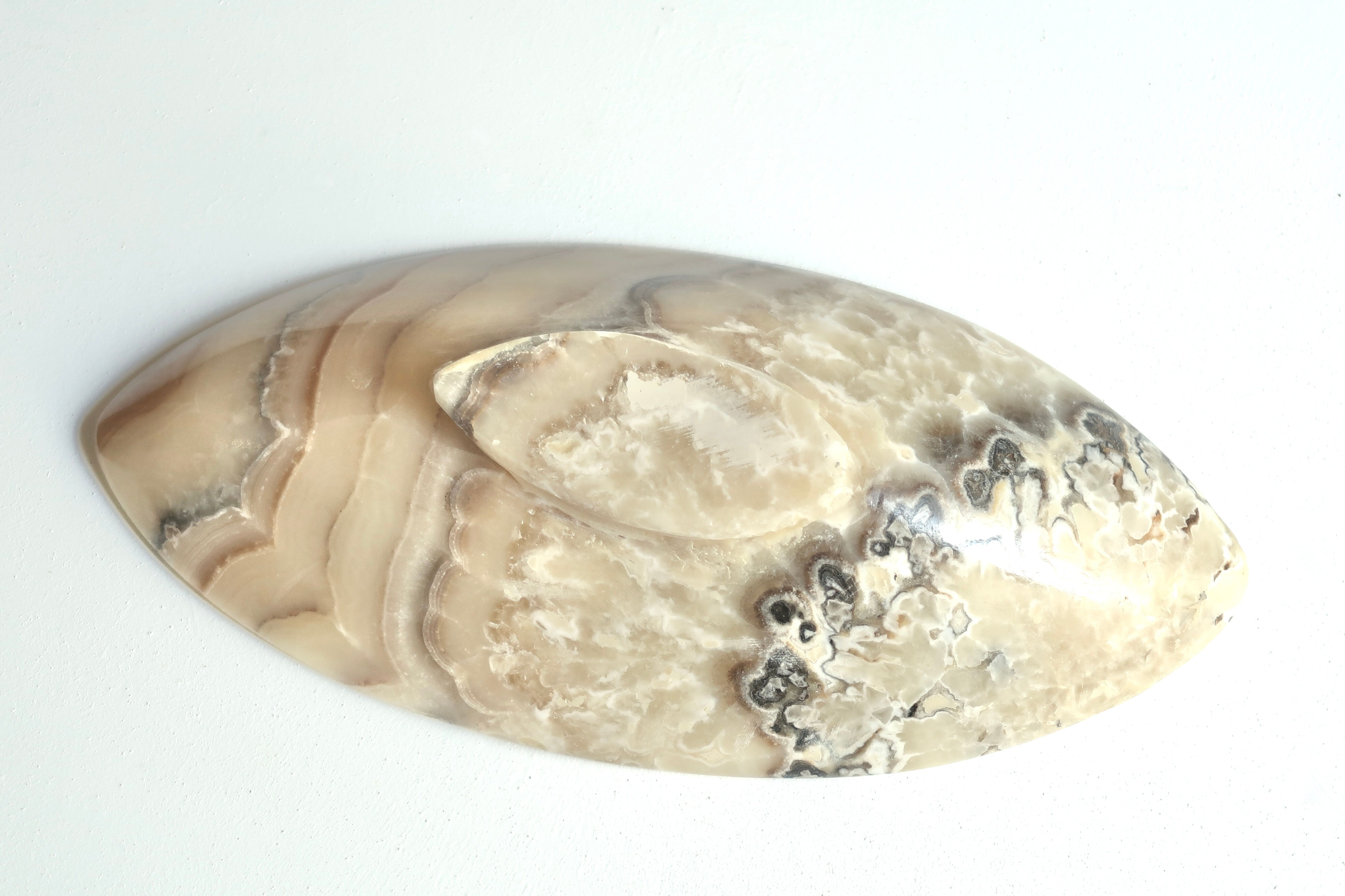 Mexican tidy in carved stone, 70s