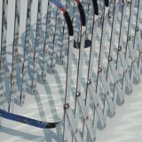 Expandable metal magazine rack