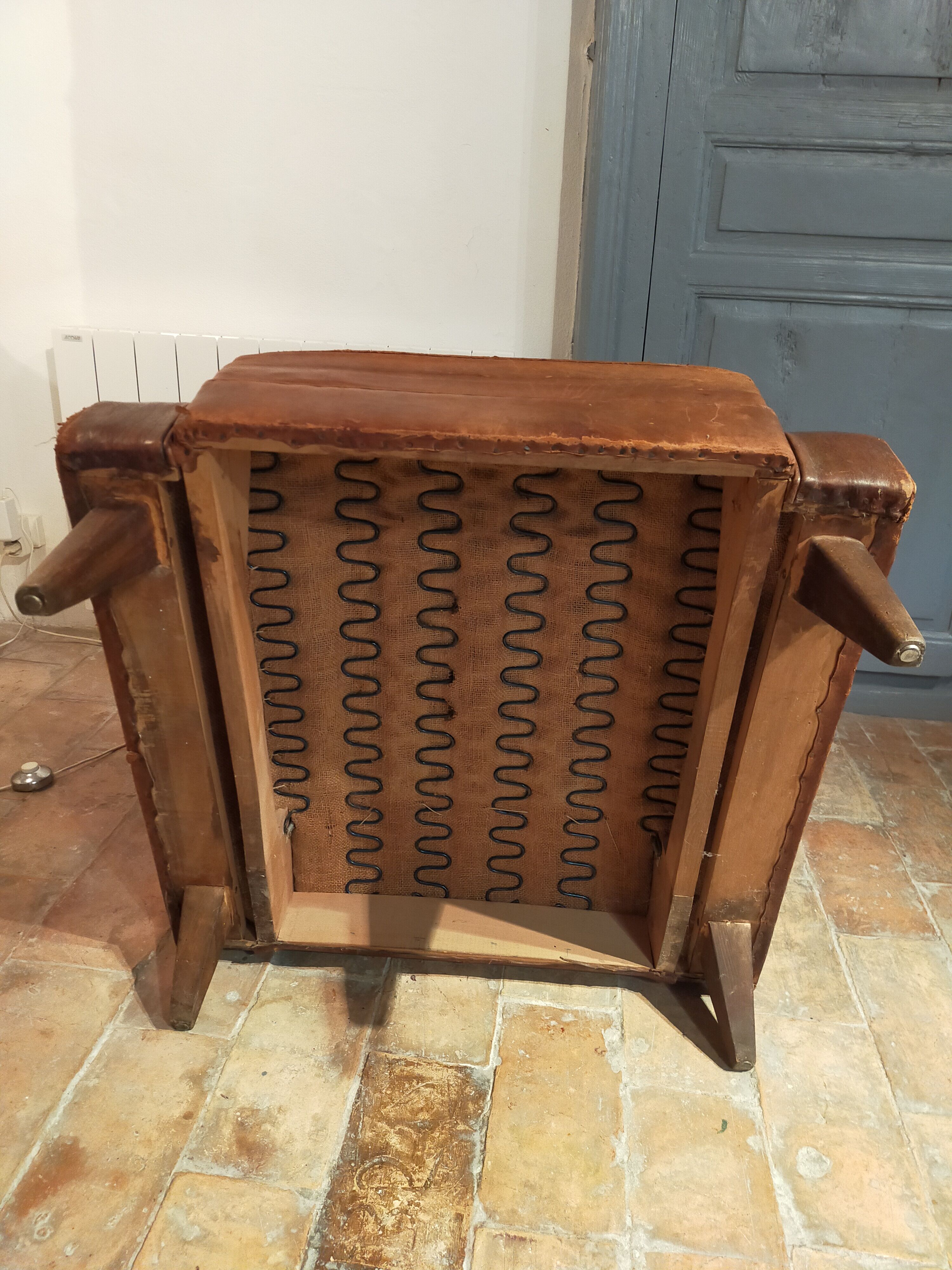 Paire de fauteuils cuir
