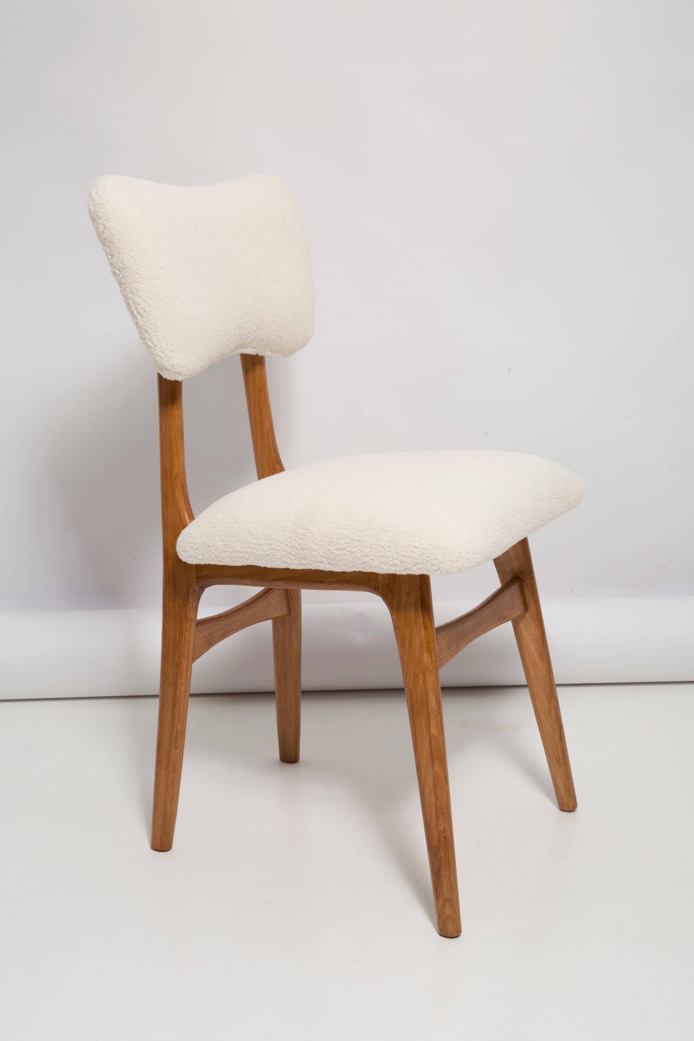 Butterfly chair in beech wood and cream boucle, Europe, 1960