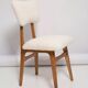 Butterfly chair in beech wood and cream boucle, Europe, 1960