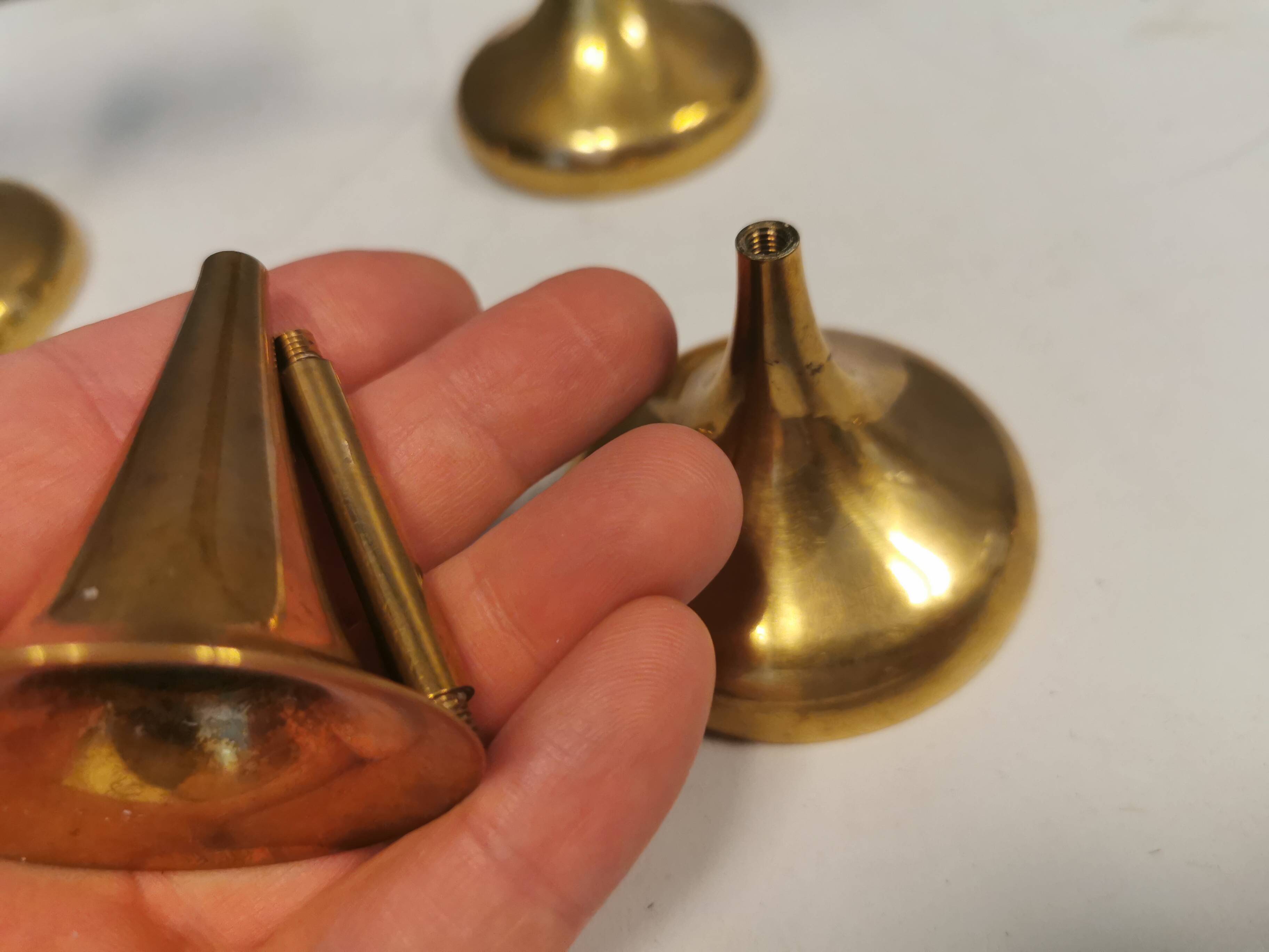 Danish designed candle holders in solid brass.