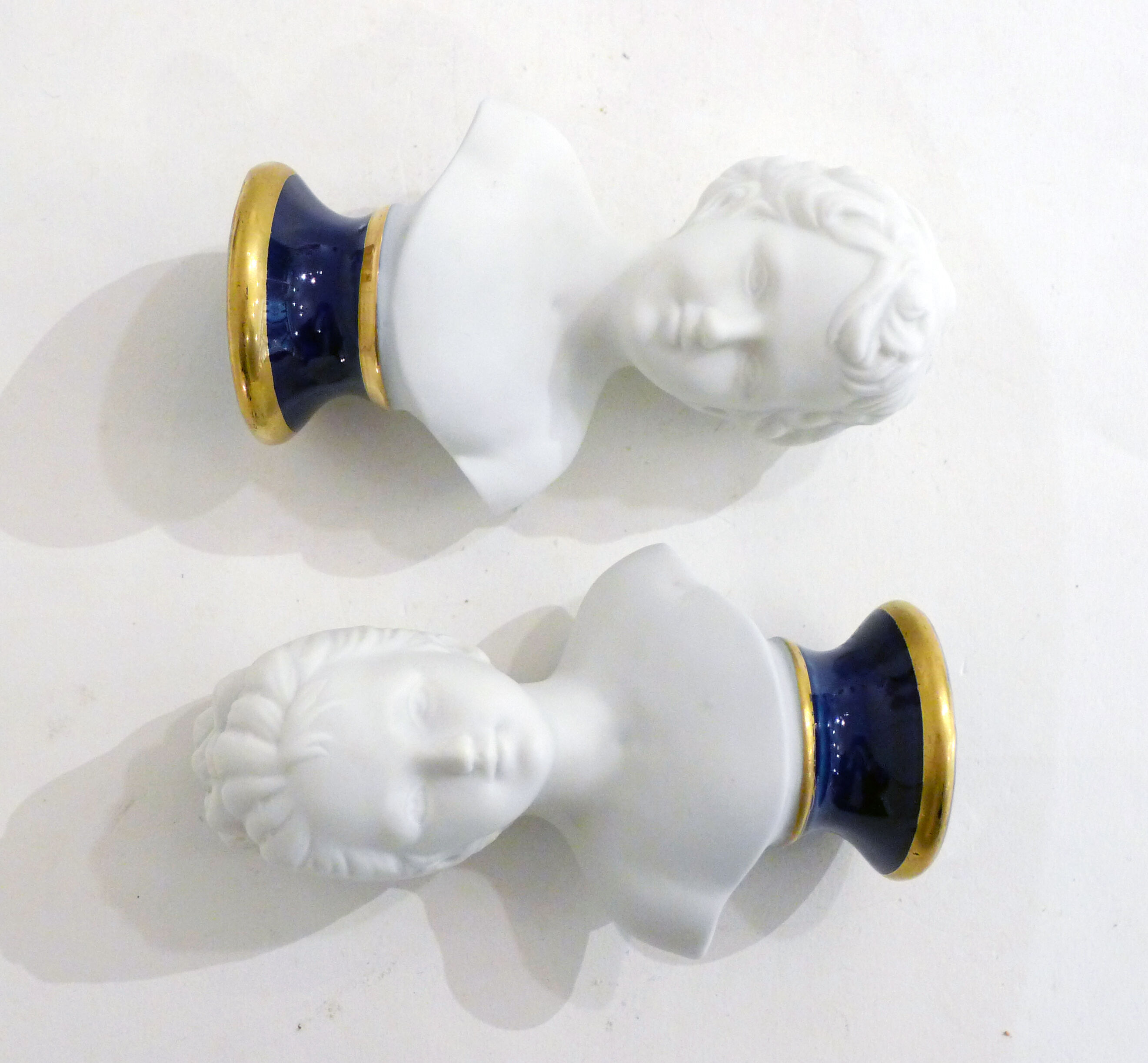 Pair of busts in biscuits