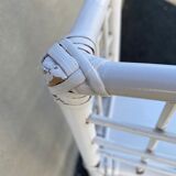 White rattan shelf with braces