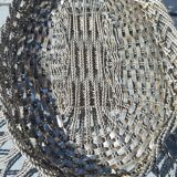 flat basket cut center table in woven metal