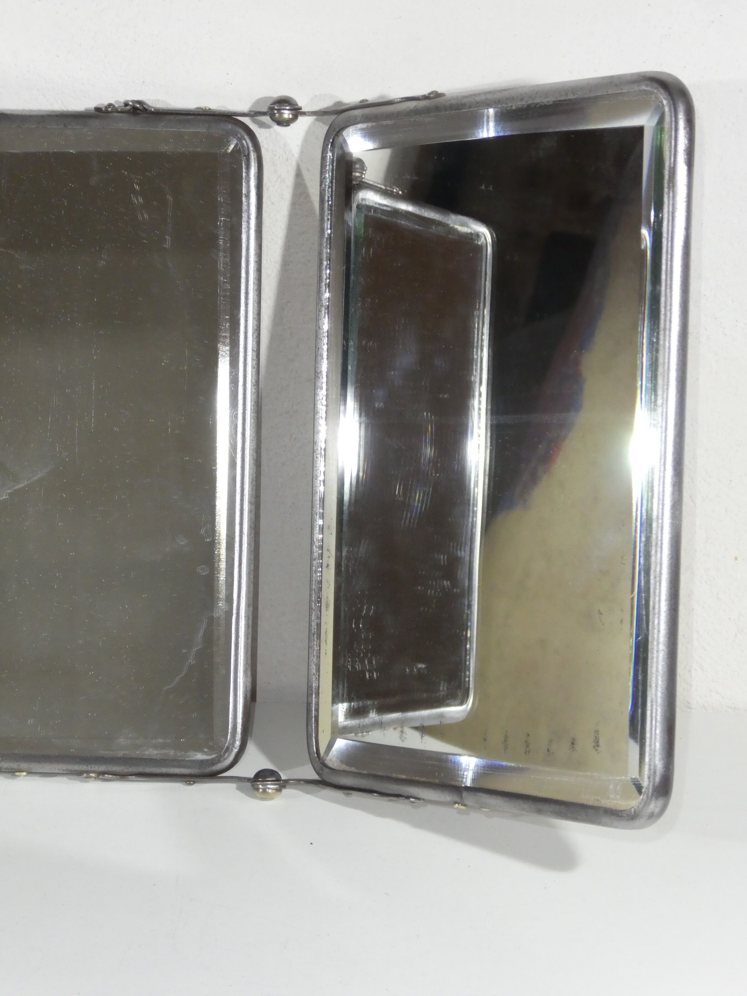 Tryptic barber's mirror