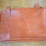 Suitcase in skai