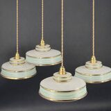 Set of 4 Art Deco pendant lights in frosted water green and gold.