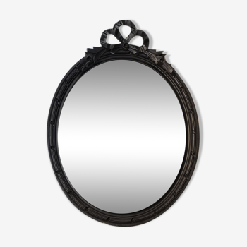 Oval mirror at ribboned knot 112x52cm