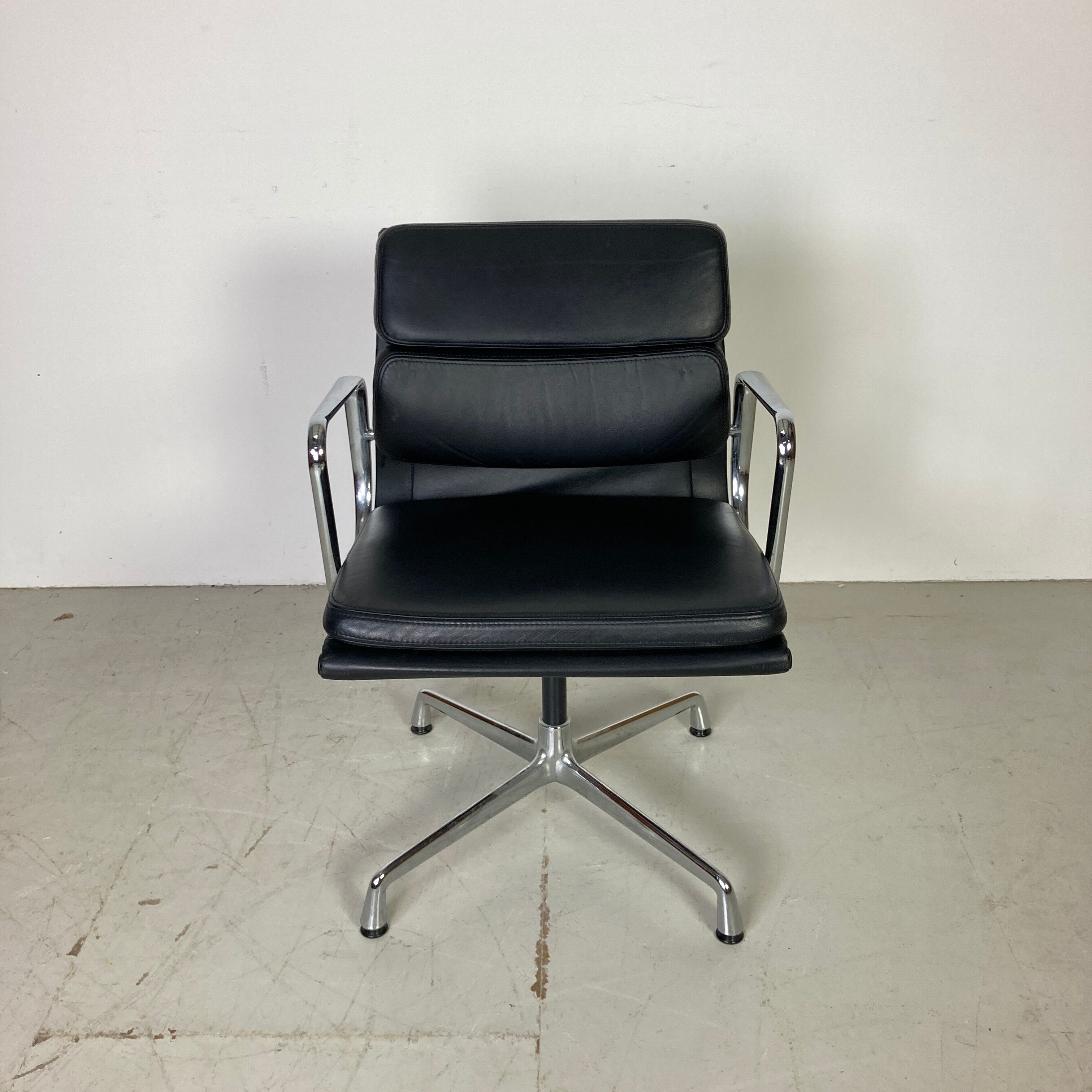 Eames black leather Soft Pad Group chair made by Vitra for Herman Miller