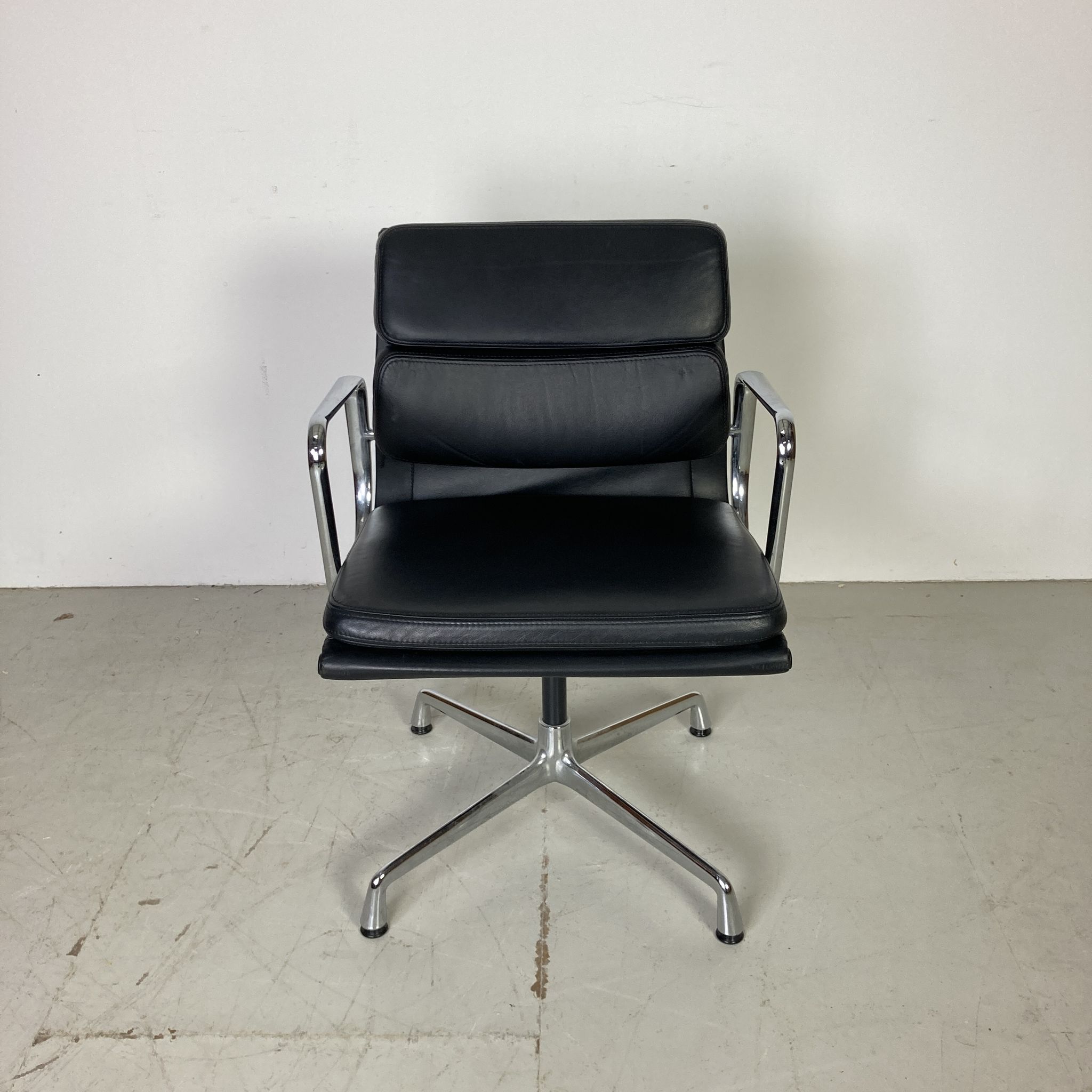 Eames black leather Soft Pad Group chair made by Vitra for Herman Miller