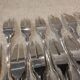 12 silver-plated metal snail forks by silversmith Noel Collet, shell design