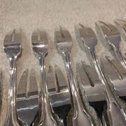 12 silver-plated metal snail forks by silversmith Noel Collet, shell design