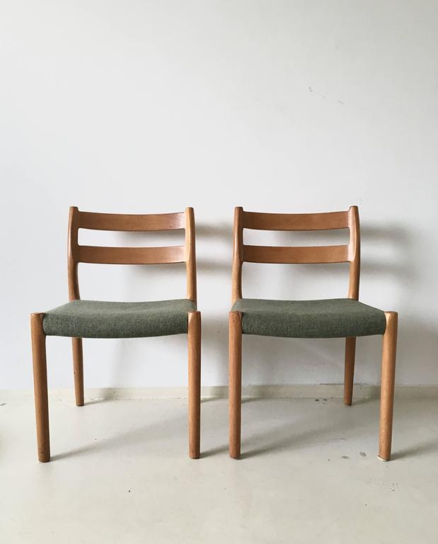 Pair of chairs by JL Moller for Hojbjerg Denmark 1960s teak