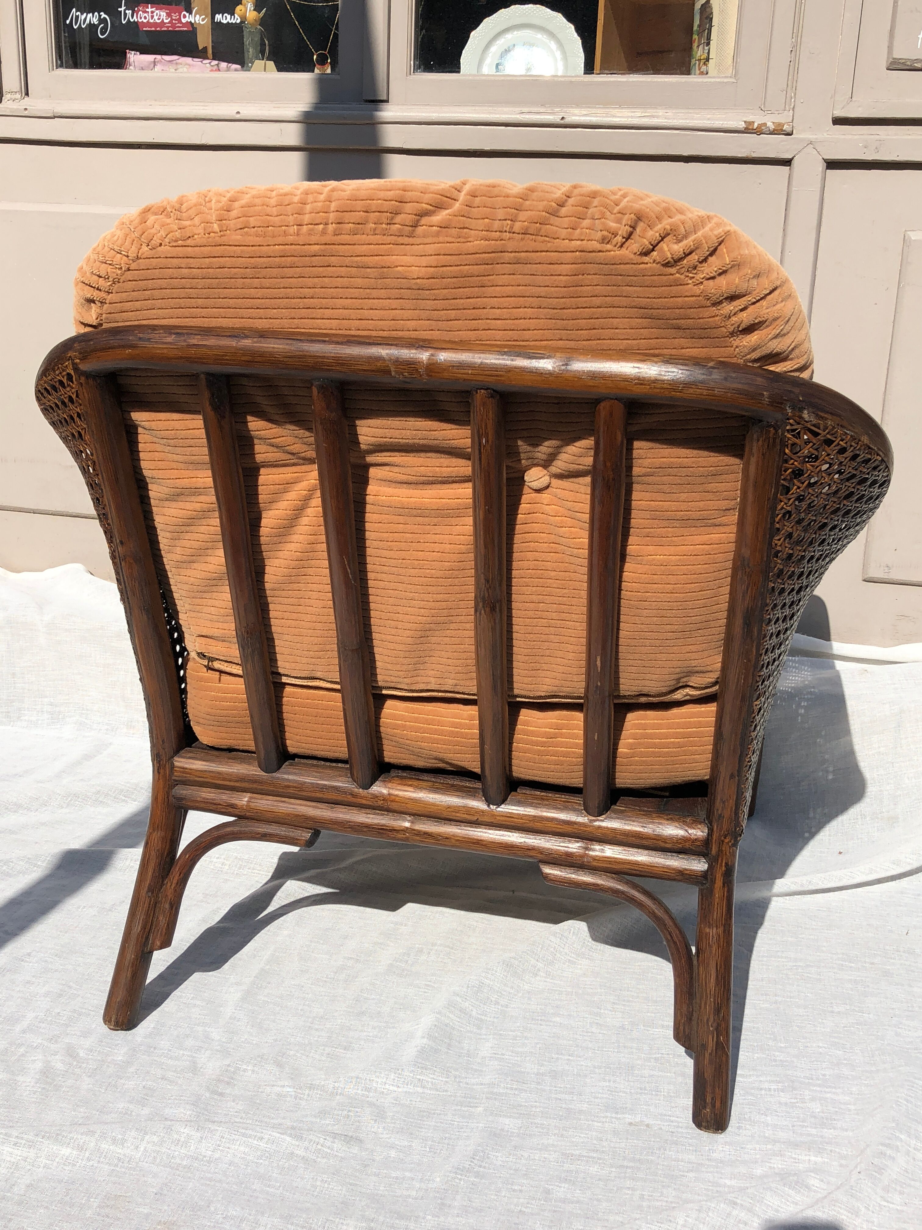 Rattan armchair and cane kok