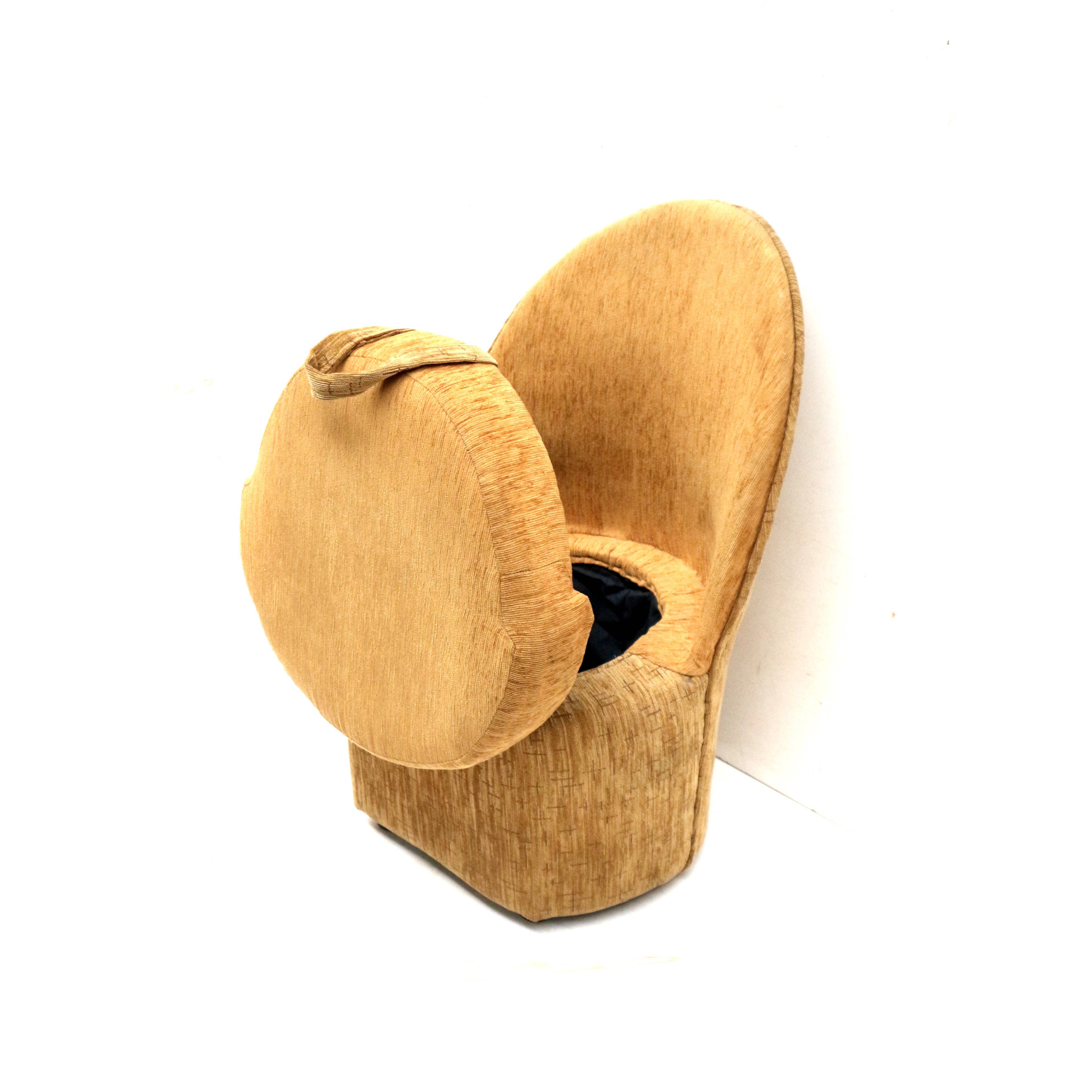 Yellow vintage armchair with storage space made in the 70s